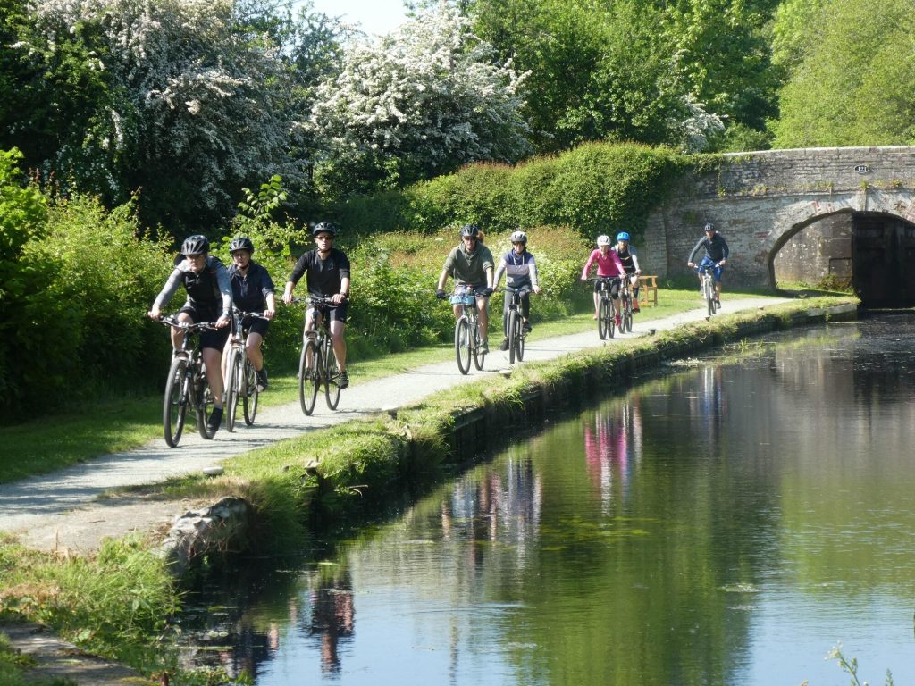 Cyclists on the Montgomery Canal towpath